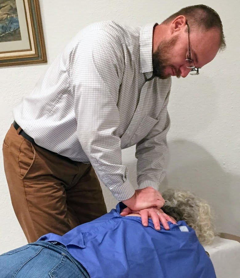 Patient receiving and adjustment for neck pain