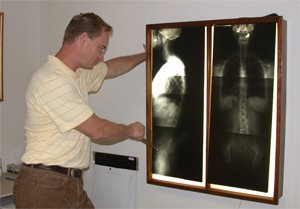 Dr Jared Specht reading an X-ray